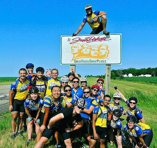 Lindsay Shulock and Team Seattle are biking across the United States to  raise money for cancer. Shulock is on the right wearing a white helmet and sunglasses. They stopped Wednesday in Oak Harbor.