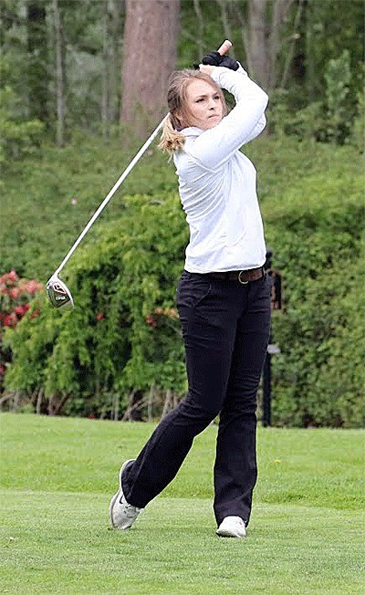 Hailey Beecher tees off on the way to winning the Wesco North tournament Tuesday.