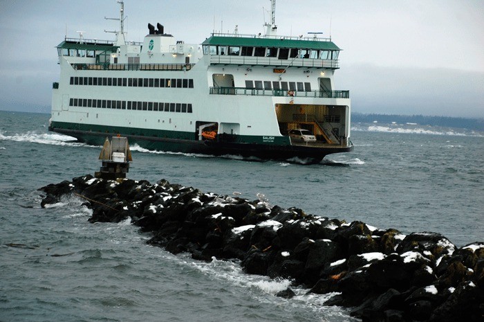 The Salish sails by a breakwater as it ventures into Keystone Harbor. Washington State ferries continual funding problems prompted officials to come up with a scenario that would eliminate the Port Townsend-to-Coupeville route to help make ends meet.