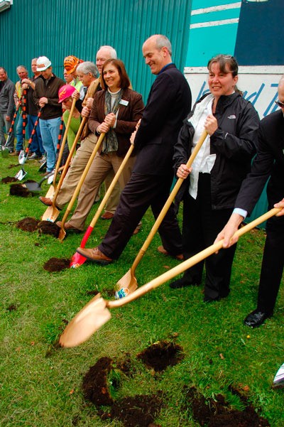 Dignitaries participate in a groundbreaking ceremony for Island Transit's new facility off Highway 20 just south of Coupeville.