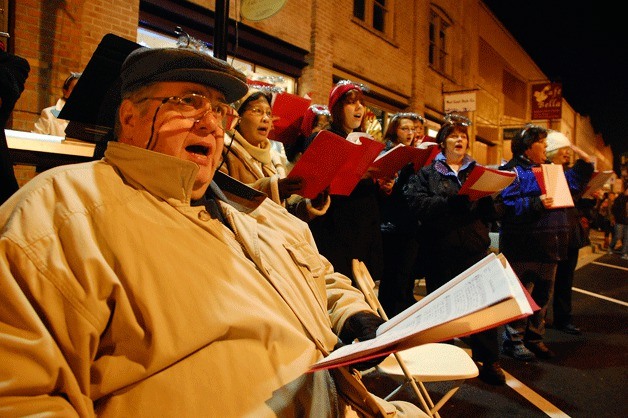 Carolers perform at the downtown Oak Harbor Holiday Magic event. This year