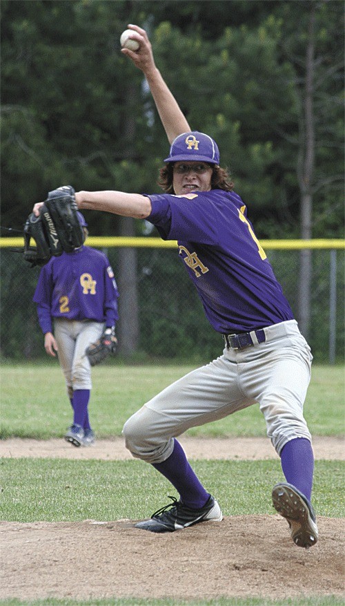 Tyler Snavely fires a pitch in a win over Anacortes earlier this spring.