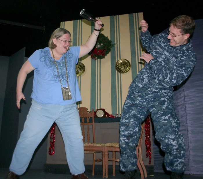 Mary K. Hallen and Stephen James Anderson demonstrate a fight move students will learn in the Whidbey Playhouse’s Sunday Fight Club course.