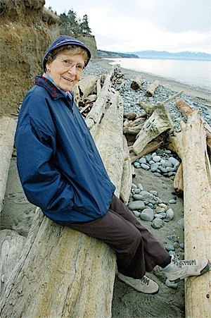 Longtime Oak Harbor resident Beatrice Morgan sits at a public beach access on West Beach Road. She recently donated 16.5 acres of beach and tidelands near there to the Whidbey Camano Land Trust.