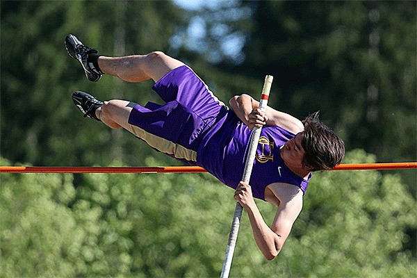 Oak Harbor's Cullen Wood soars to third place in the pole vault.