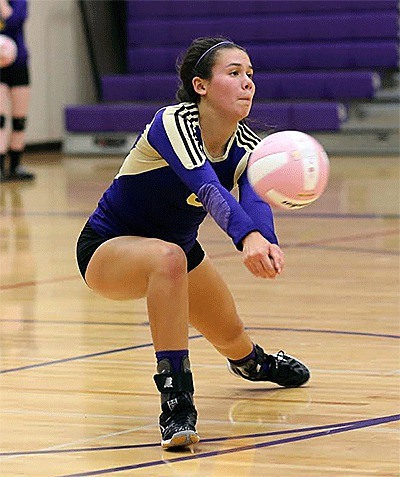 AnnaBelle Whitefoote reaches for a dig in Wednesday's match with Shorewood.