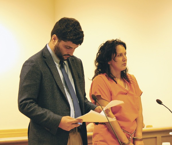 Jeanette M. Narverud appears in Island County Superior Court Monday with attorney Andrew Rice. She’s accused of assaulting police officers and an acquaintance.