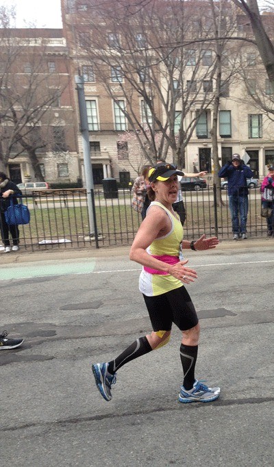 Vicky King running just past the 25-mile mark at the Boston Marathon Monday. About a mile later is when she and her sister heard the first of two explosions.