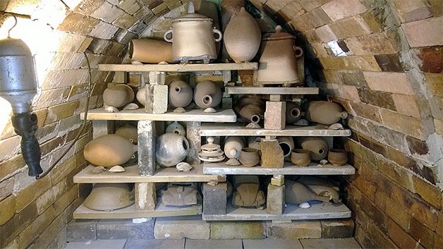 A look inside Oak Harbor potter Dan Ishler’s wood-burning kiln partially stacked before firing. The process involves about two chords of wood to fire over the course of three-to-four days. Ishler’s work and others will appear at an art show Nov. 28-30 at the Coupeville Recreation Hall.