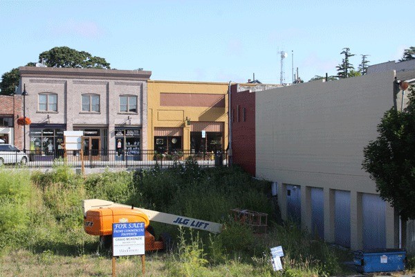 The bare wall on a building on Pioneer Way in downtown Oak Harbor will soon be transformed by a mural painted by Nancy Hakala. The project will start July 8 and could take four-to-six weeks.