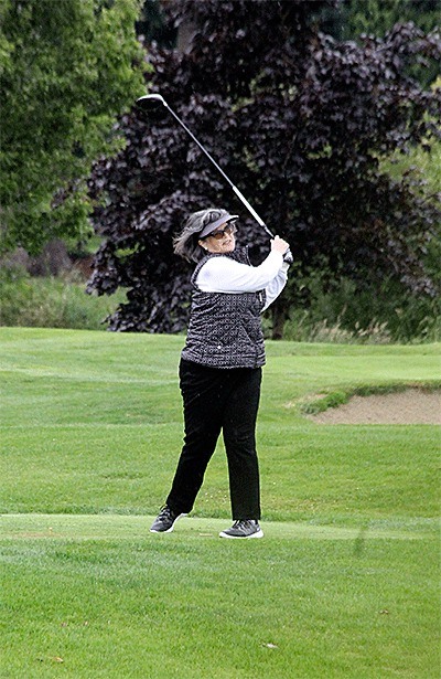 Paula Oldenburg tees off in the Ladies Invitational. Oldenburg