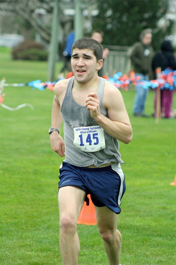 Wyatt Golding of Seattle nears the finish line in his win in the 10th Annual Whidbey Island Marathon Sunday.