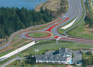 This illustration shows how the roundabout at Sharpes Corner on Highway 20 in Anacortes might look. Thousands of Whidbey Islanders will experience the roundabout when it opens in 2012