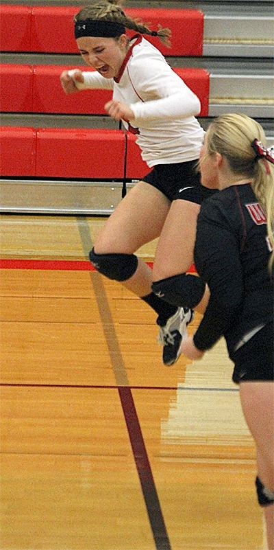 Valen Trujillo celebrates a set win in Thursday's match with Chimacum.