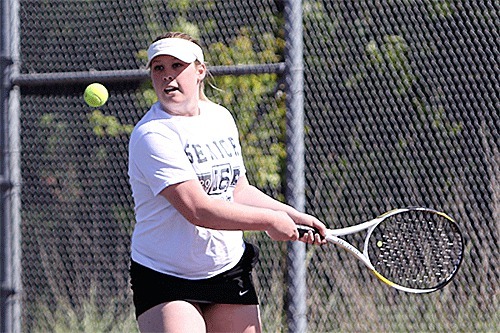 Sydney Autio prepares to swat a backhand in her win Monday afternoon.