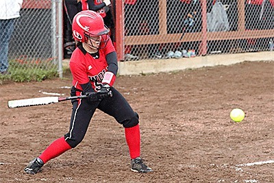 Coupeville's Lauren Rose takes a cut in Monday's game with Sultan.