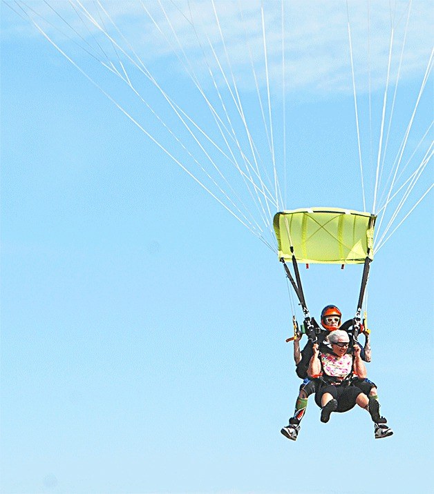 Dorothy Bell nears the ground at the end of her first tandem skydive Saturday on her 81st birthday.