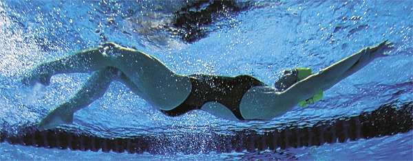 Oak Harbor's Ciara Hu makes a turn on the way to placing eighth in the 200 individual medley at the state meet.