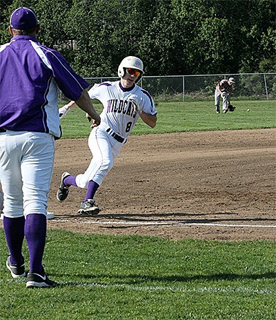 Kevyn Johnson rounds third on the way to scoring Oak Harbor's only run Tuesday.