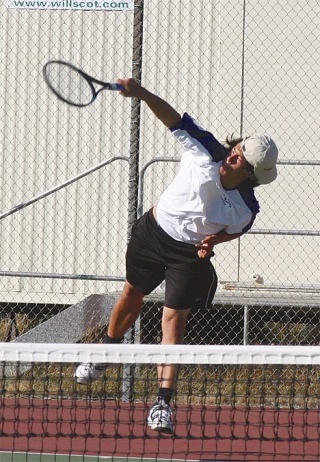 Oak Harbor senior Derek Thomas delivers a serve in a match against Lake Stevens. Thomas was one of the top four singles players in the WesCo North.