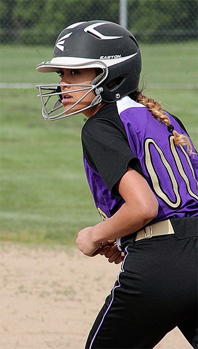 Courtesy runner Krissy Pagala looks into home plate during the Wildcats' win over Stanwood Tuesday.