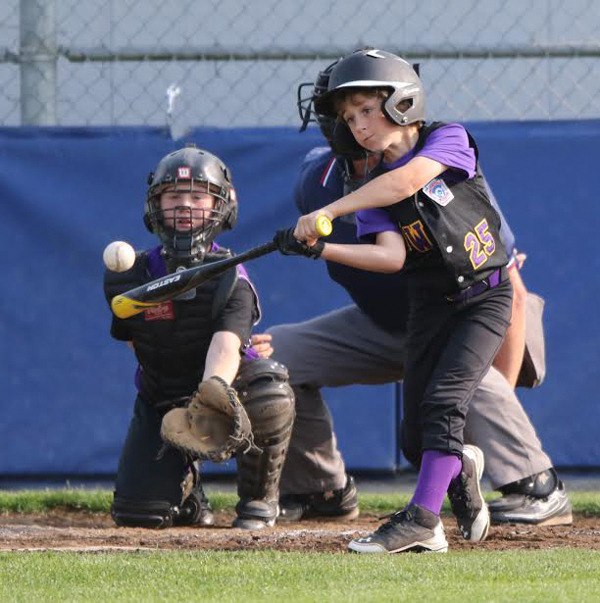 Tyler Abbott squares up a pitch for North Whidbey.