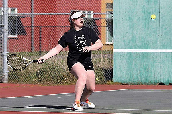 Sydney Autio prepares to return a shot in her win in second singles.