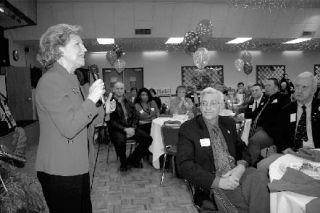 Rep. Barbara Bailey speaks to a large group of supporters during her kickoff breakfast Tuesday morning in Oak Harbor. Rep. Bruce Chandler from the 15th District