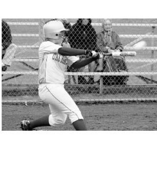 Oak Harbor’s Jessica Kallander collects one of her many base hits during the 2008 softball season. The all-star broke the school records for hits