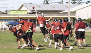 Coupeville’s defensive unit gets ready for the first game and puts the heat on the scout-team’s offense.