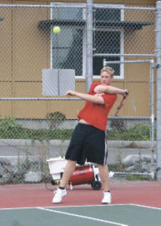 Senior Jeff Boyer gets good velocity on the ball.