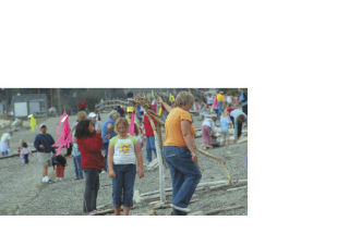 Participants scour the beach at Windjammer Park for suitable art materials at last year’s Driftwood Day. The event will be back this Saturday