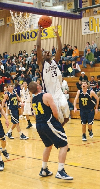 Rashaad Smith takes the ball to the basket to score. Smith had a team-high 15 points in Tuesday’s game.