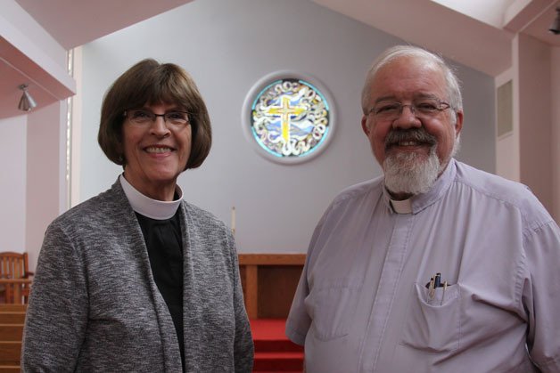 Reverend Rilla Barrett and Deacon Dennis Taylor see a brighter future at St. Stephen’s Episcopal Church in Oak Harbor now that their sanctuary features a new stained glass window created by artist Larry Marcell. It replaces a wooden cross that was removed from the church last summer.