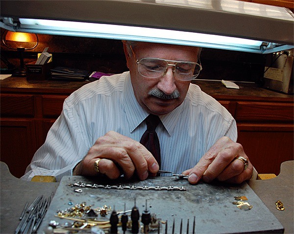 Whidbey Island Jeweler owner Jeff Mack works at his bench in his new store front on Barrow Street. The business celebrated its 20 anniversary