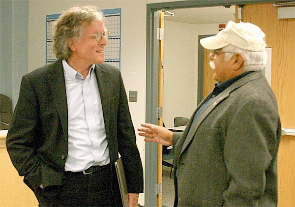 Larry Cort talks with Coupeville resident Ricardo Reyes after being appointed to the Coupeville Town Council Tuesday night. Reyes was one of the people who applied for the vacancy on the Coupeville Town Council.