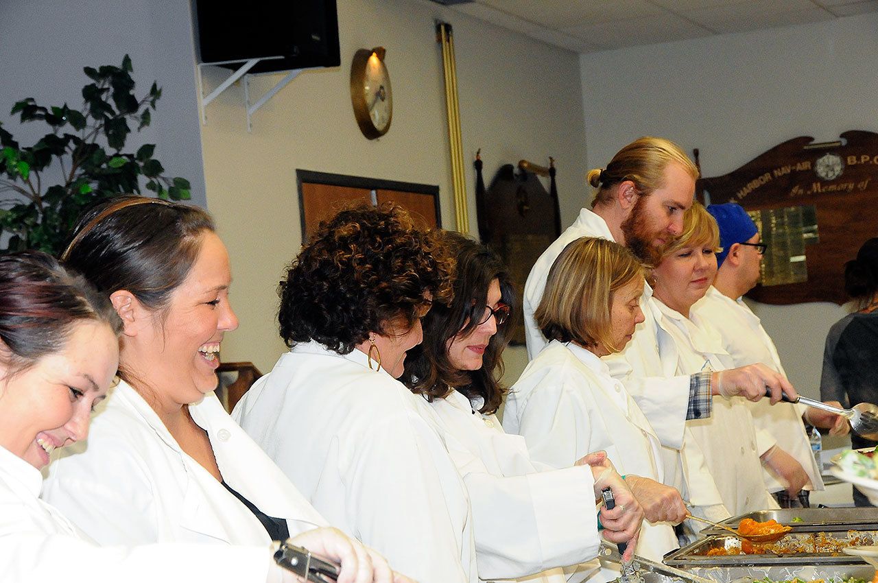 Volunteers have been helping serve the community at the North Whidbey Community Harvest for 15 years. A free Thanksgiving Day meal will be served Thursday at the Oak Harbor Elks Lodge. Photo provided by Skip Pohtilla.                                Volunteers have been helping serve the community at the North Whidbey Community Harvest for 15 years. A free Thanksgiving Day meal will be served Thursday at the Oak Harbor Elks Lodge. Photo provided by Skip Pohtilla.