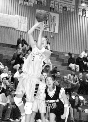 Heidi McNeill (5) goes up for a shot in a game earlier in the week against Monroe. McNeill had eight third-quarter points last Friday against Snohomish.