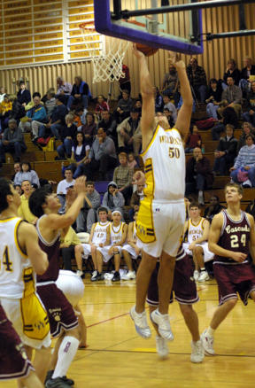 Six-foot-six center Jon Jansen lays-in two of his six points against Cascade. He was also a defensive presence