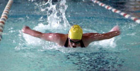 Splashing her way into third place in the 100 butterfly