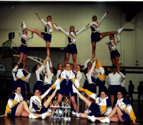 The Oak Harbor Wildcats cheer squad shows off  the hardware that they captured at last weekend’s Washington State Cheer Championship’s at Juanita High School.