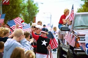 American flags were much in demand along the parade route practically everyone had one or was handed one