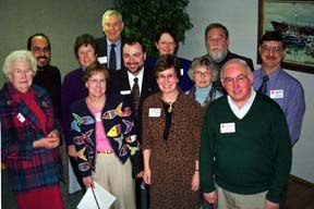 United Way of Island County officers for 2002 gather after the annual meeting Wednesday. In front from the left are .Jo Balda