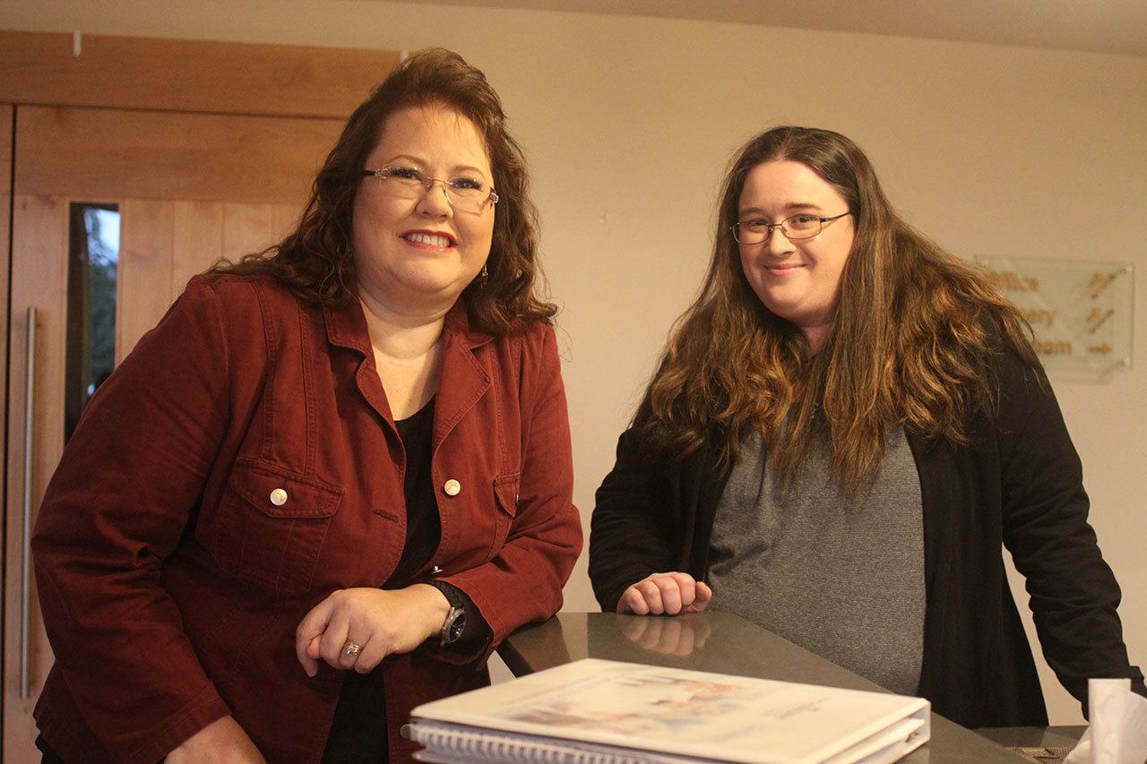 Michelle Oakland, left, worship pastor at Life Church in Oak Harbor, and administrator Laura LeBeau are coordinating “Night to Shine,” a prom night catered to people 14 and older who have special needs. The event in Oak Harbor is Feb. 10. Photo by Ron Newberry/Whidbey News-Times