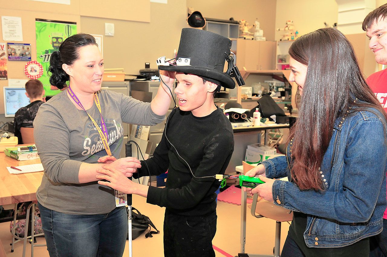 Blind student gets high-tech hat created by Robotics Team