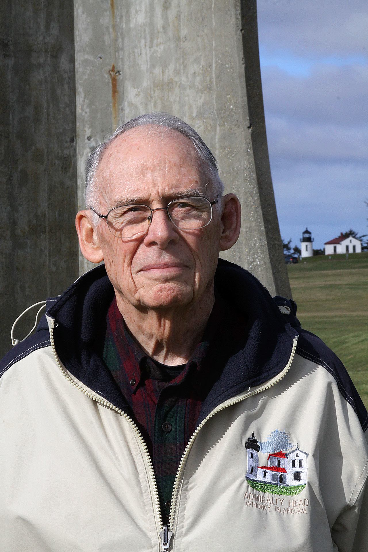 Volunteer Dick Malone of Oak Harbor stands on the grounds of Fort Casey State Park in Coupeville Thursday, Feb. 16, 2017. Malone, who provides guided tours of the former World War I-era army post and is a docent at Admiralty Head Lighthouse, was named ‘Volunteer of the Year’ by Washington State Parks this month. Photo by Ron Newberry/Whidbey News-Times