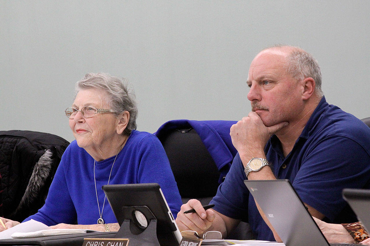 Coupeville School Board Member Chris Chan, right, said he does not plan to seek reelection after serving nine years. Board member Kathleen Anderson, left, is also up for reelection and does plan to run again. Photo by Ron Newberry/Whidbey News Times