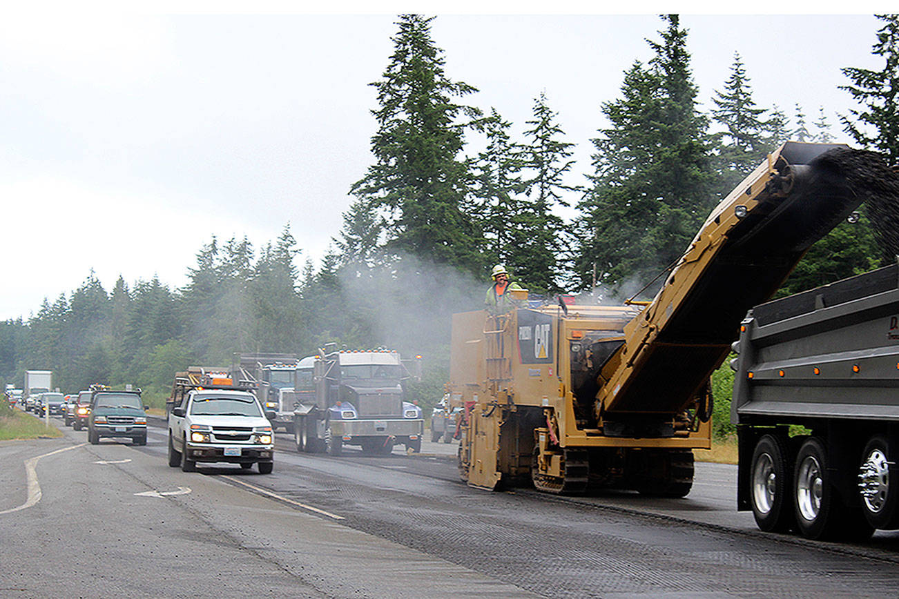 Road crews will be out all summer repaving more than 30 miles of Highway 525/State 20 from Coupeville to Clinton. Drivers should allow an extra 30 minutes for their trips and to catch ferries. Crews worked near the intersection of Classic Road and HIghway 525 Tuesday morning putting down new asphalt and rolling it out. Whidbey’s main corridor work is long overdue, officials say.