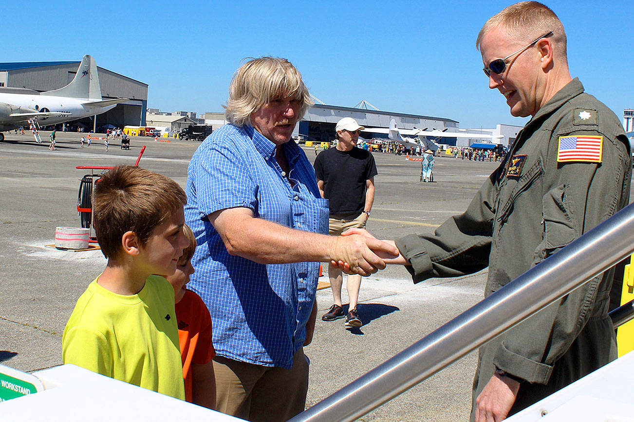 At Saturday’s NAS Whidbey Island open house, the public looked over vintage aircraft and one brand new jet just delivered from Boeing.