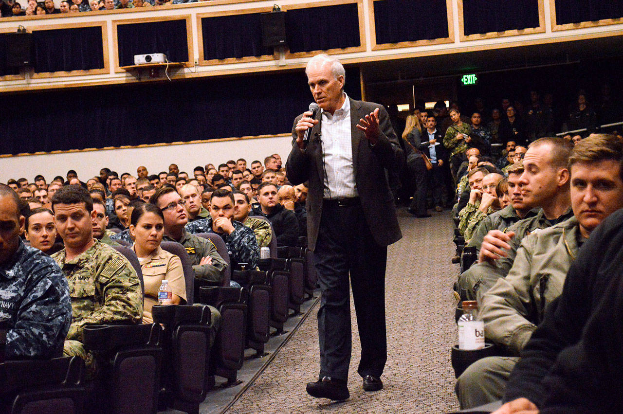 Richard V. Spencer, secretary of the Navy, addresses a packed theater Tuesday morning at Naval Air Station Whidbey Island. Photo by Laura Guido/Whidbey News-Times